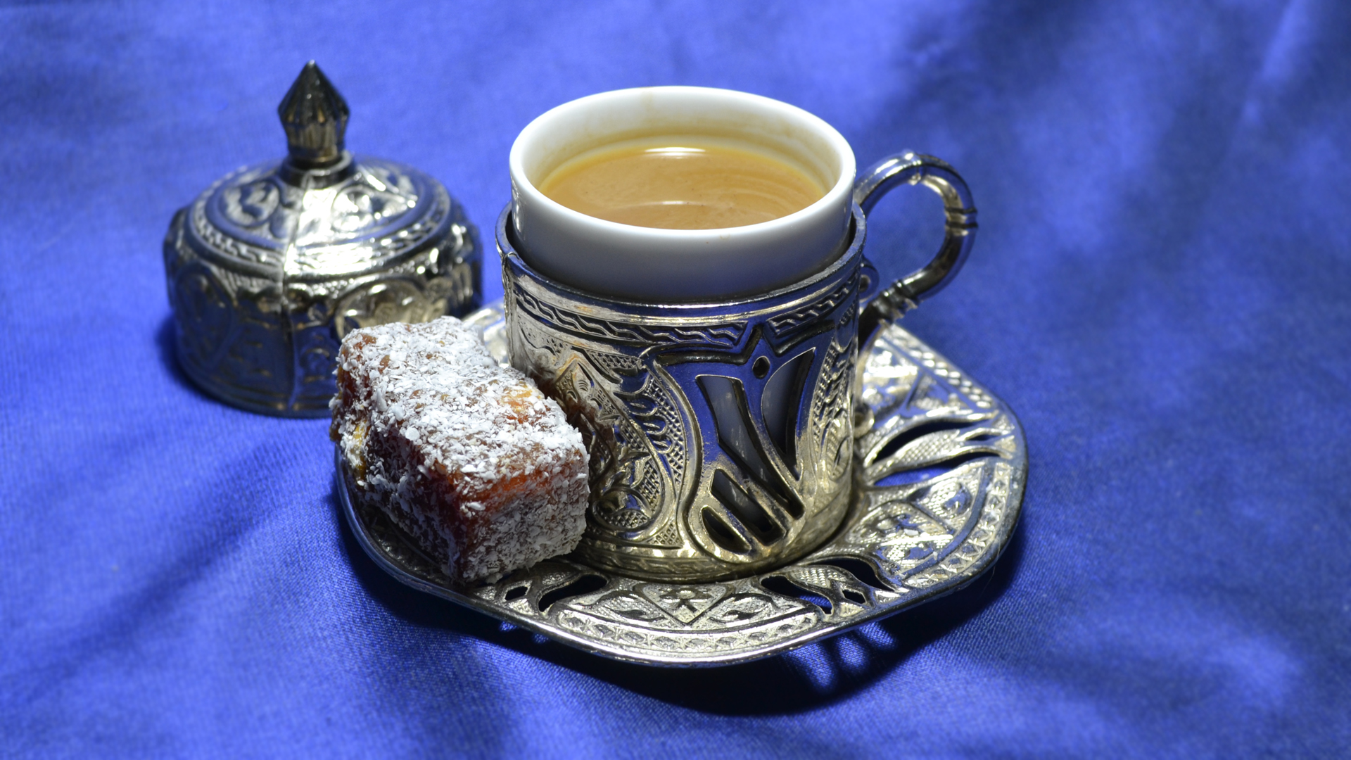 Turkish coffee with mastic and cezerye, served with traditional Turkish dessert in an authentic setting.